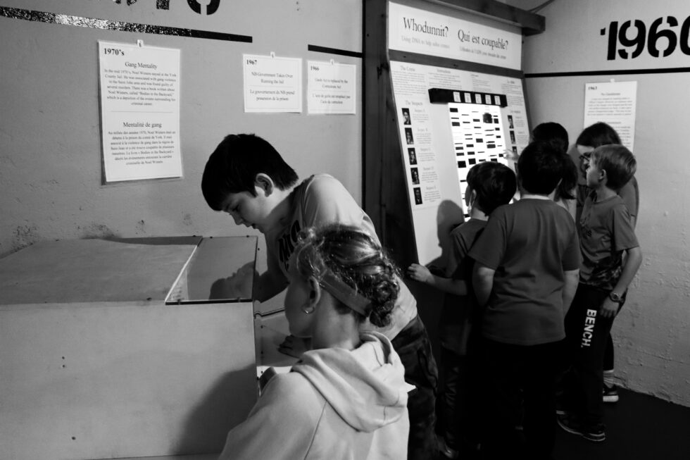 Visitors-explore-forensics-exhibit-Science-East-980x653